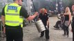 Policeman rocks out to heavy metal band at UK festival
