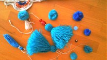 Pompones para decorar cubrecama