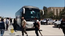 Syrians leave rebel stronghold Al Waer under evacuation deal