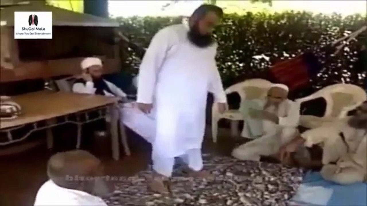 Molana Tariq Jameel with his friends