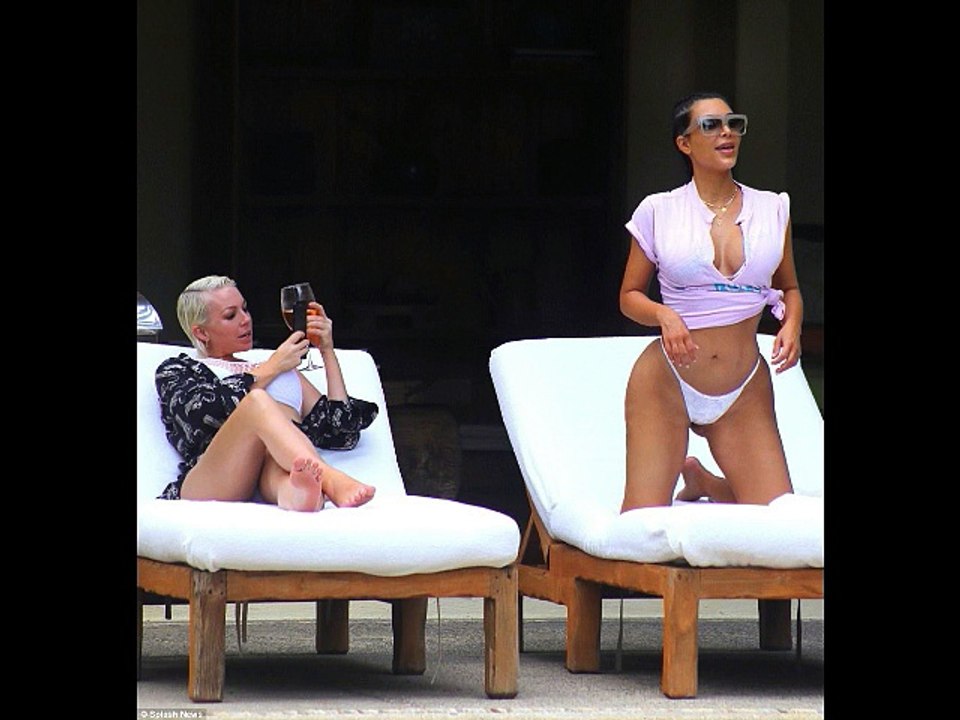 Kim Kardashian flaunts curvy figure in crop top in Mexico