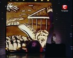 Amazing performance by an artist. She draws with fingers. Amazing