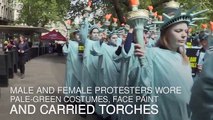 100 'Statues of Liberty' protest against Donald Trump -