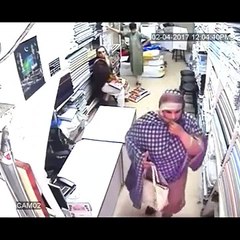 woman steals from shop