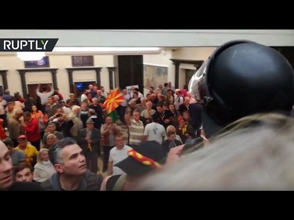 Macedonian MPs under attack as protesters storm parliament building