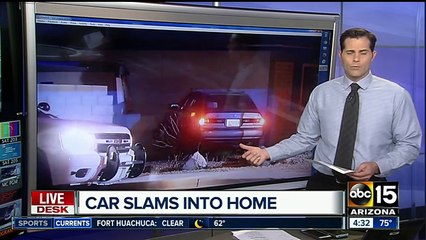 Police looking for driver after car crashes into north Phoenix home