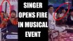 Gujarat folk singer opens fire in the air during in musical event | Oneindia News