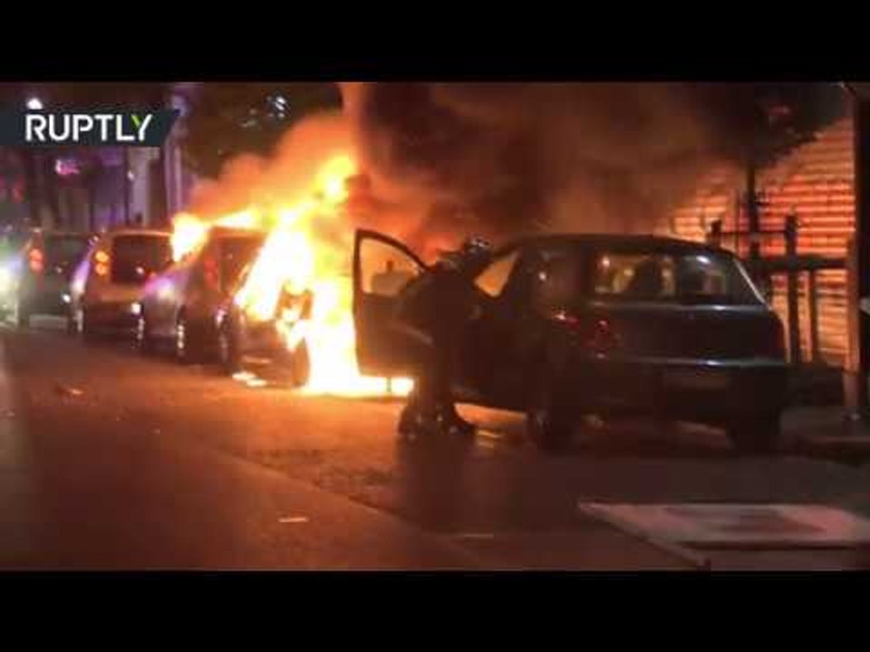 Paris protests end in flames as youths set cars on fire