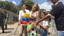 Lilian Tintori and Kids Sing Happy Birthday To Jailed Leader Leopoldo Lopez Outside of Prison