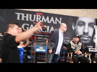 Keith Thurman Dapping everyone up at presser BTS
