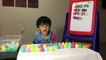 Learning ABC by matching surprise eggs with fridge letter magnets-KvL