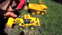 Dump Truck Dozer annd Backhoe Make a Dirt Road-sC8MGq-