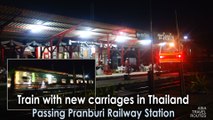 Train with new carriages, passing Pranburi Railway Station