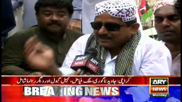 PPP leader Nabil Gabol rides a donkey cart on May Day