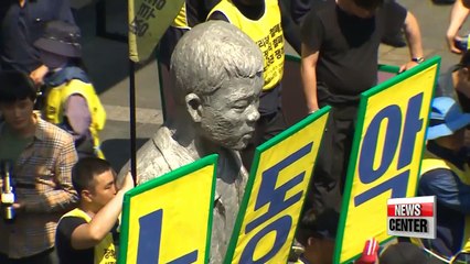 Ahn vows to improve working conditions, seek public participation in gov't