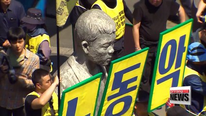 Ahn vows to improve working conditions, seek public participation in gov't