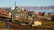 After being displaced from their native village, a Greenlandic Inugguit community faces a new threat: climate change