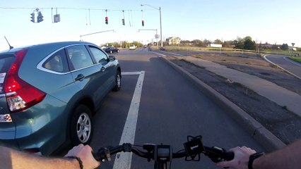 Cyclist vs. Driver on Cell Phone Road Rage