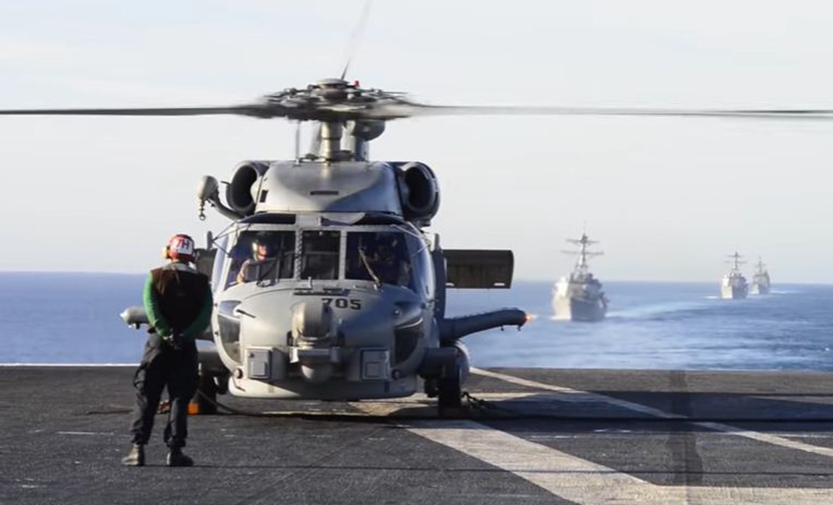 US Massive Aircraft-Carrier Escorted and Protected by Large Amount of US Navy Ships