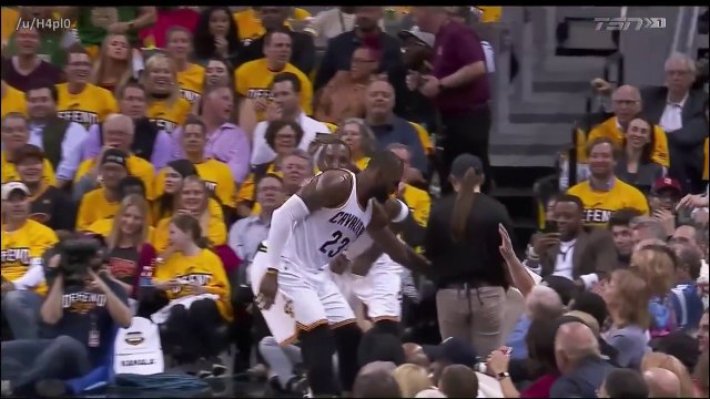 En plein match, LeBron James prend une bière à une serveuse