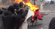 Protesters Push Flaming Cart Towards Police During May Day Clashes in Paris