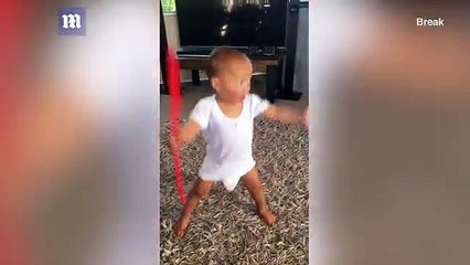 Excitable toddler performs his own version of the Haka dance