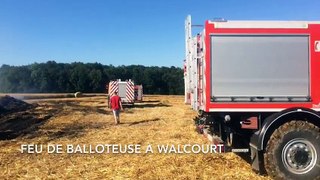 Walcourt_ une balloteuse prend feu dans un champ à Vogenée....