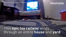 Ride this tiny train through the gigantic Lego railroad of your dreams