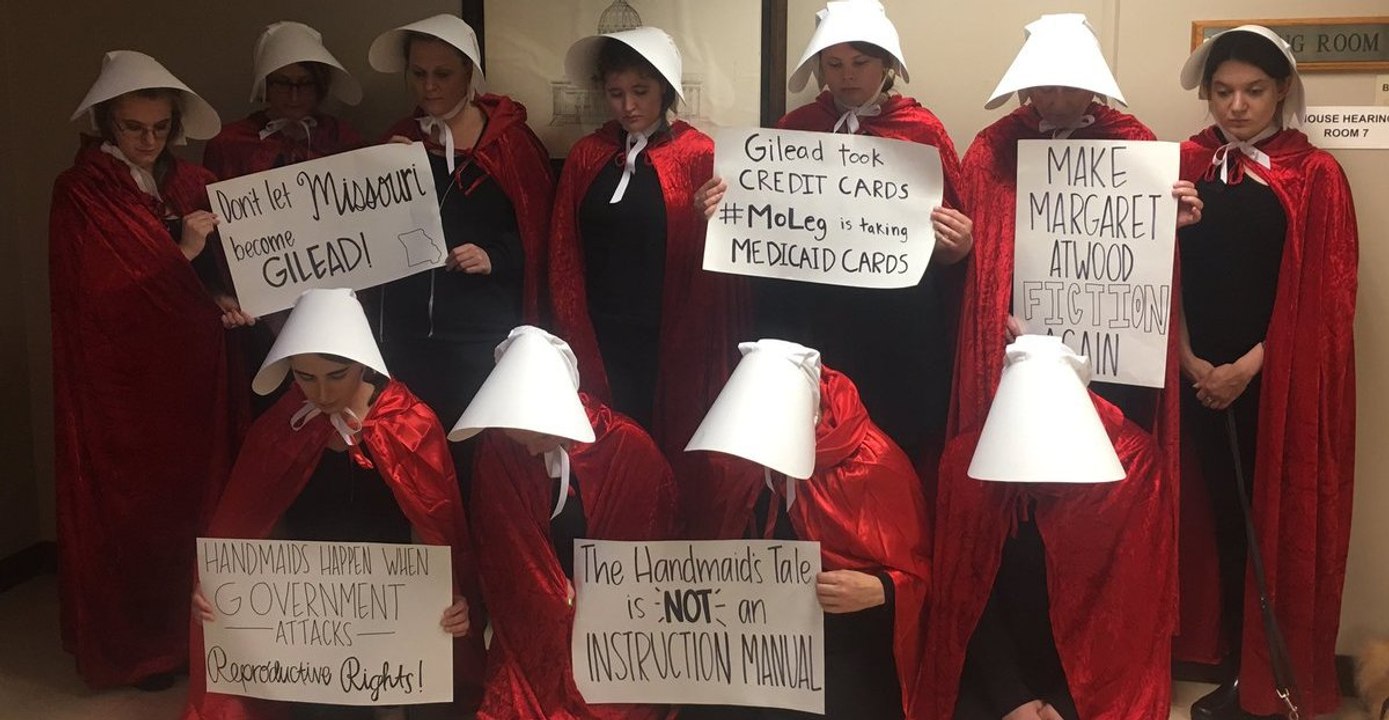 Eleven 'Handmaids' Protest Restrictions on Reproductive Care at Missouri State Capitol