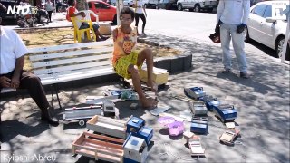 Armless man builds toys using his feet