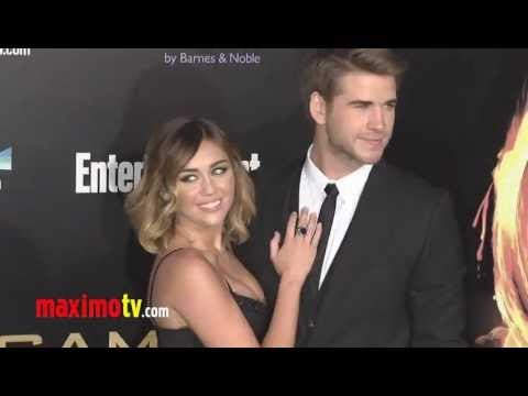 Miley Cyrus and Liam Hemsworth at The Hunger Games Premiere Arrivals