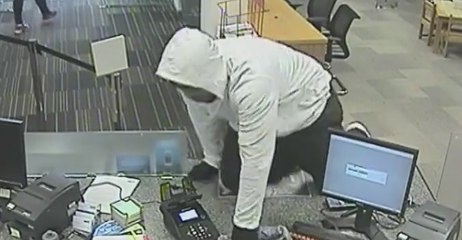 Man Wanted After Leaping Over Auckland Bank Counter in Robbery