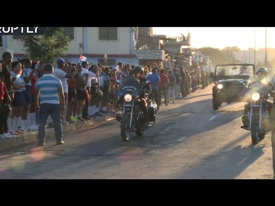 Thousands of Cubans line Santiago streets to pay their respects as Castro's ashes interred privately
