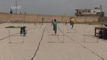 Children in war-torn Aleppo compete in local 'Olympics'