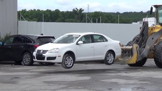GETTING A WRECKED 2010 VW JETTA TDI at an AUTCTION