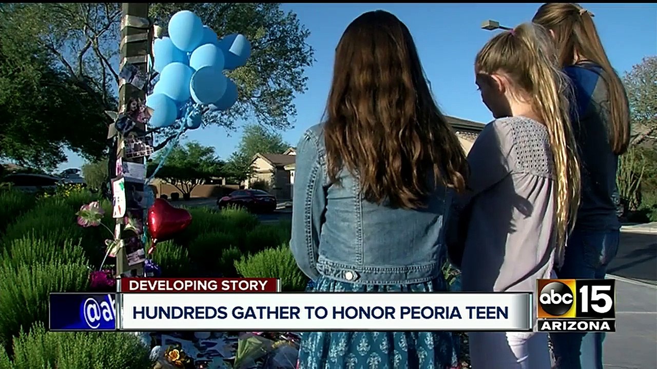 Family, friends hold vigil for girl killed in Peoria crash