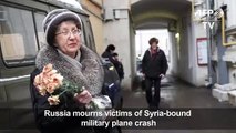 Mourners gather in Moscow to honour military plane crash victims