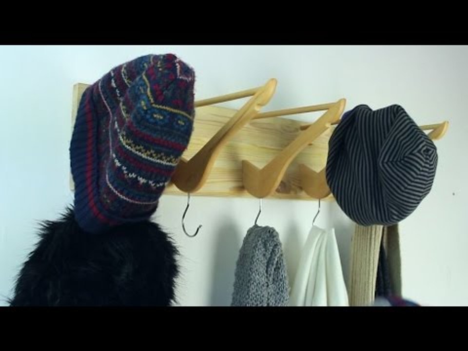 Organize your entry with this quirky coat rack made from wooden hangers