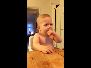 Baby laughing hysterically at coconut by larbr.com