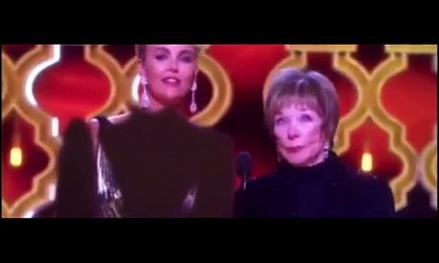 Iran TV draws dark clothes onto Charlize Theron at Oscars