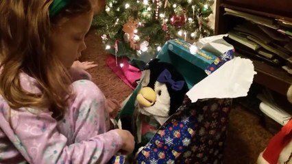Little Girl Gets a Fish Bowl Penguin for Christmas!