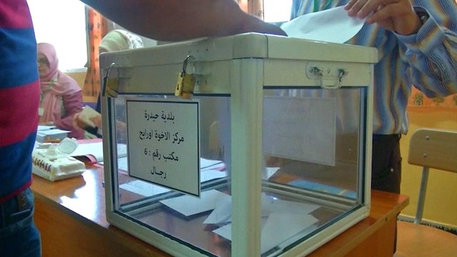 Algeria's National Liberation Front wins majority in parliamentary elections