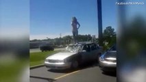 Woman caught on video STOMPING through a man's windshield