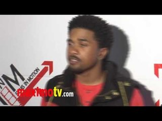 MANN (Rapper) at "BLOOD OUT" Premiere Red Carpet