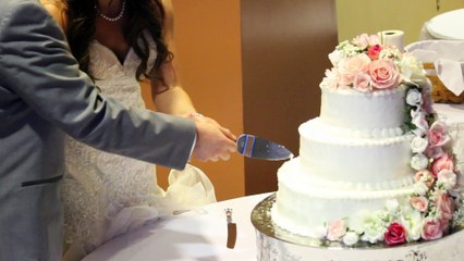 Mark and Kristina Scott cutting of the wedding cake April 2017