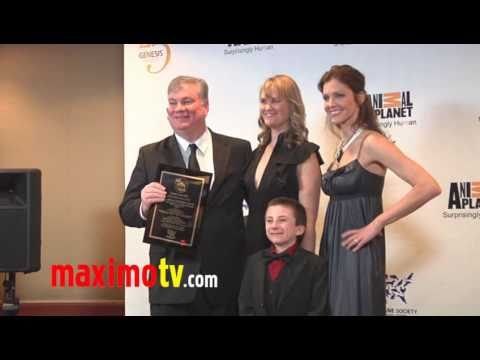 TRICIA HELFER & ATTICUS SHAFFER Genesis Awards 2011 Press Room