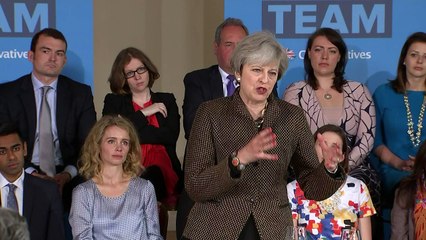 May commits to 'tens of thousands' net migration target