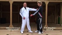 Wing Chun for beginners lesson 29 combo blocking a straight punch and countering with a side kick
