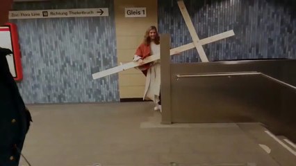 Jesus Gets His Cross Stuck In Underground Station Roof As He Travels Up The Es