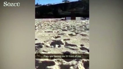 Etrafa aldırmadan plajın ortasında sevişen çift...
